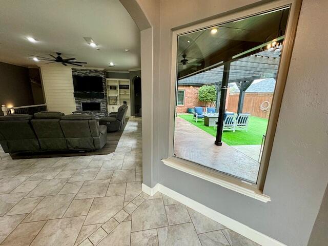 4028 125th Street Lubbock, TX 79423 - Photo 9 of 44 a lobby with furniture and a floor to ceiling window