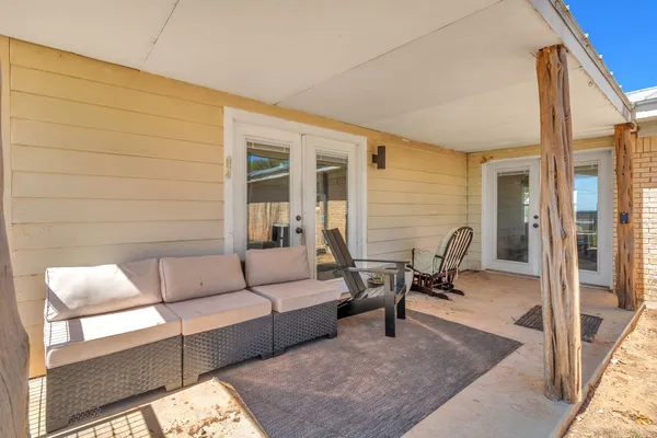 a view of living room filled with furniture