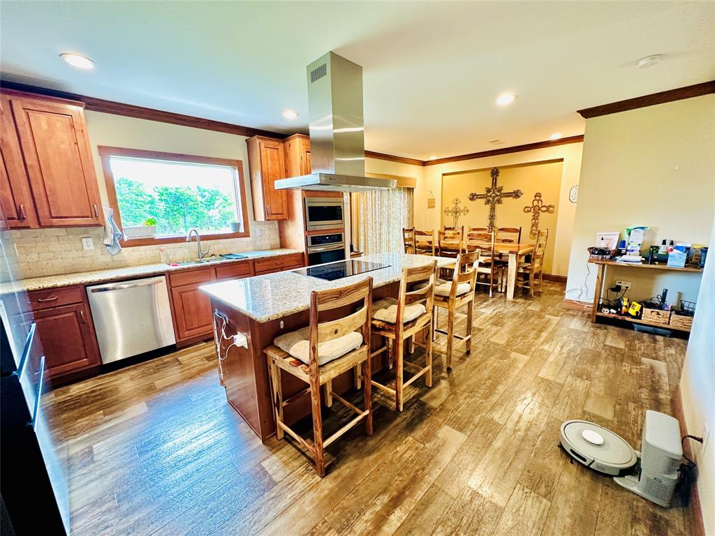 251 County Road 225 Rising Star, TX 76471 - Photo 11 of 40 a outdoor space with furniture a window and wooden floor