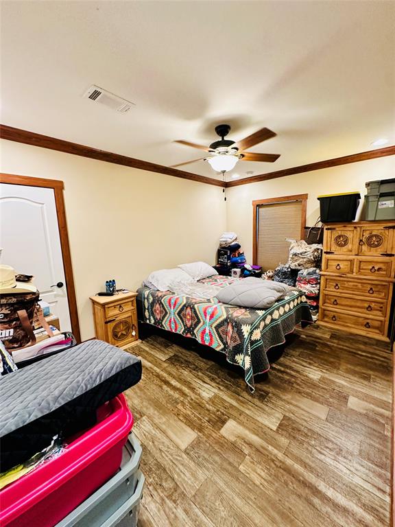 251 County Road 225 Rising Star, TX 76471 - Photo 26 of 40 a bedroom with bed and window