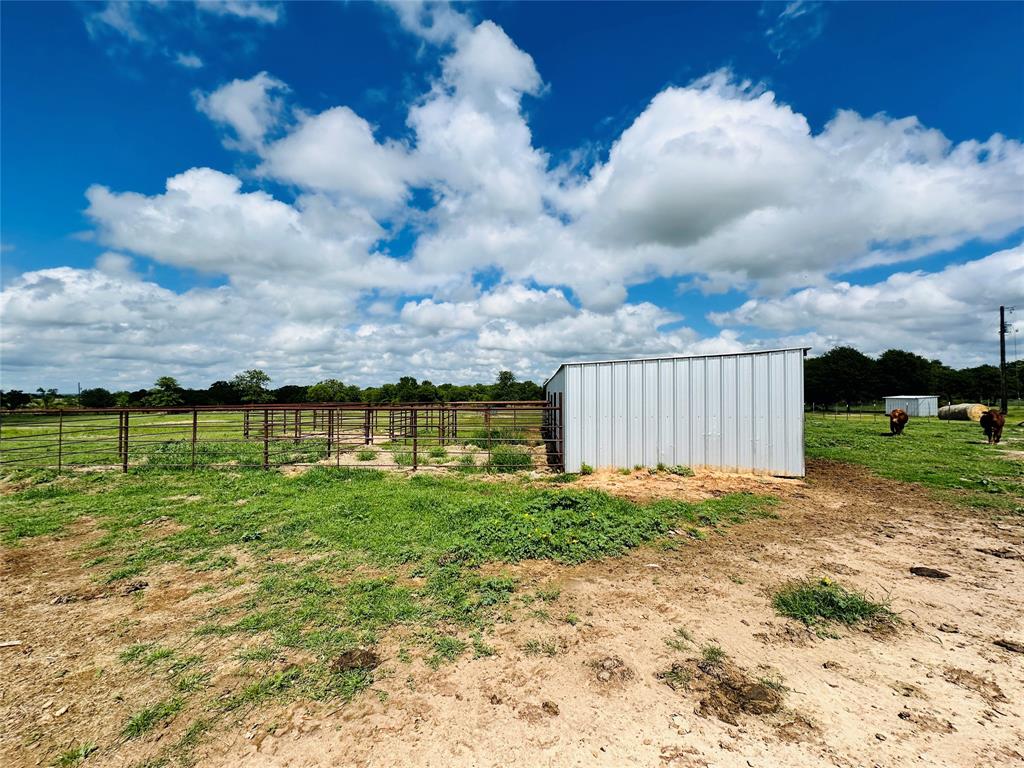 251 County Road 225 Rising Star, TX 76471 - Photo 33 of 40 a view of a garden with an outdoor space
