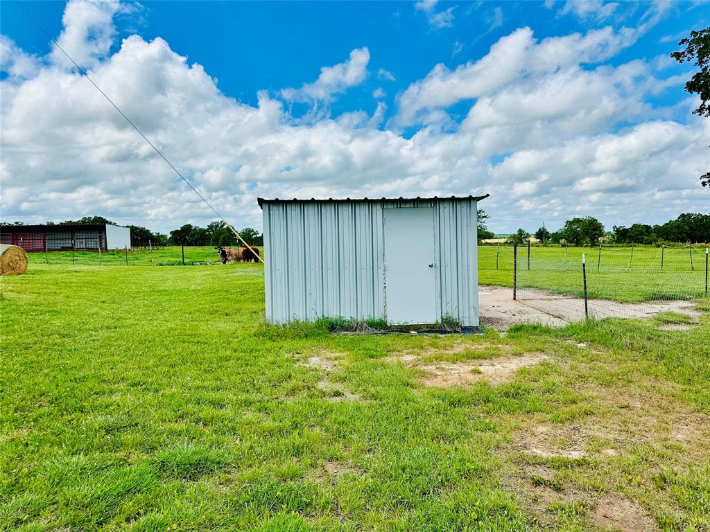 251 County Road 225 Rising Star, TX 76471 - Photo 35 of 40 a view of a backyard