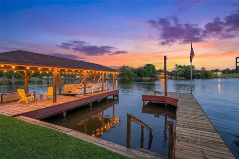a view of an house with backyard porch and patio