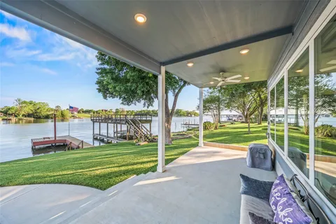 a view of a porch and garden