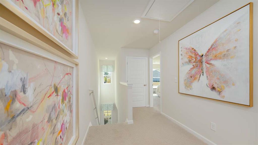 2080 Moss Hill Road Stone Mountain, GA 30083 - Photo 14 of 31 a view of a hallway with paintings on the wall
