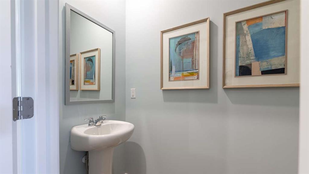 2080 Moss Hill Road Stone Mountain, GA 30083 - Photo 4 of 31 a bathroom with a sink and mirror