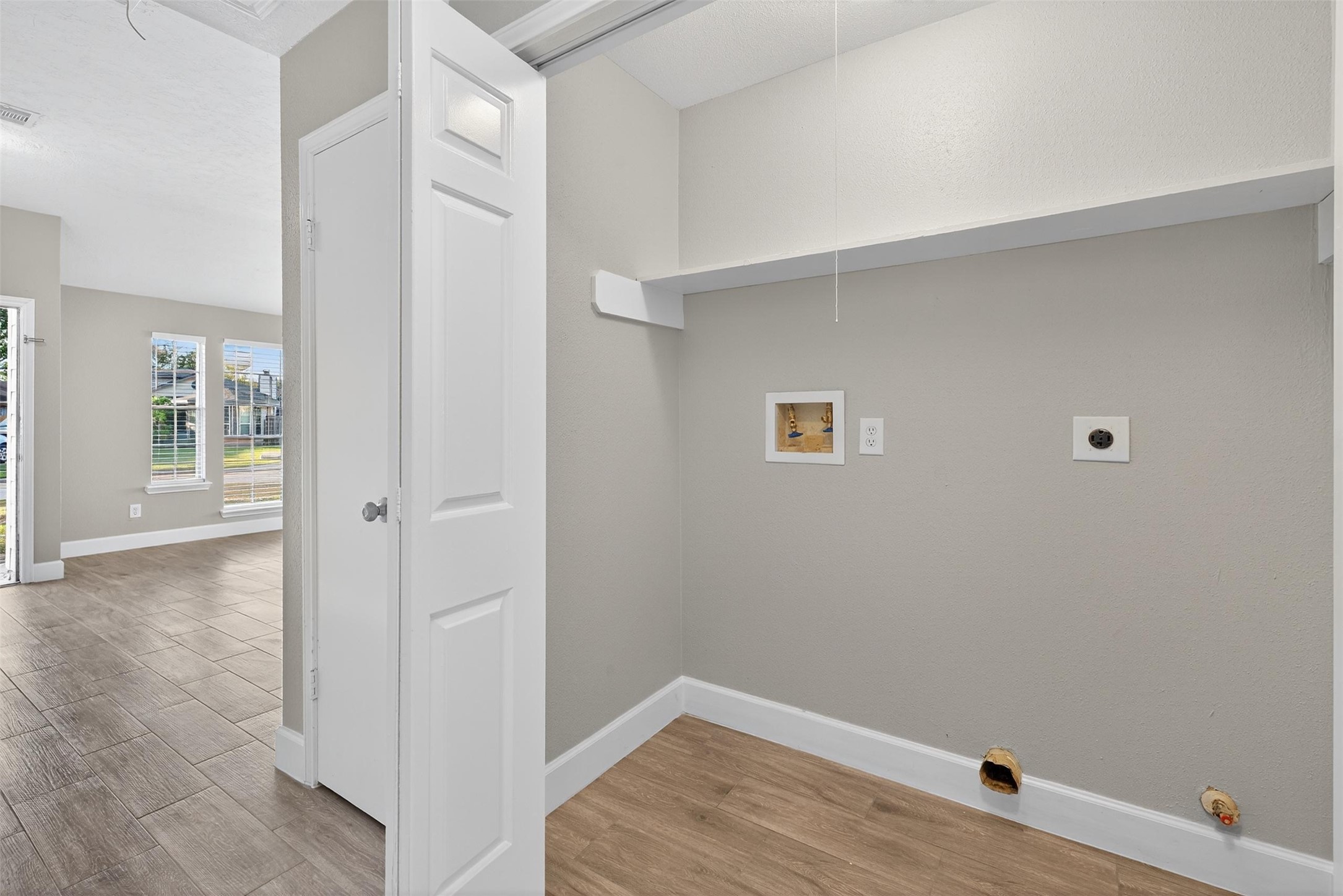 11046 Rainbow Glen Drive Houston, TX 77064 - Photo 11 of 17 a view of a room with wooden floor