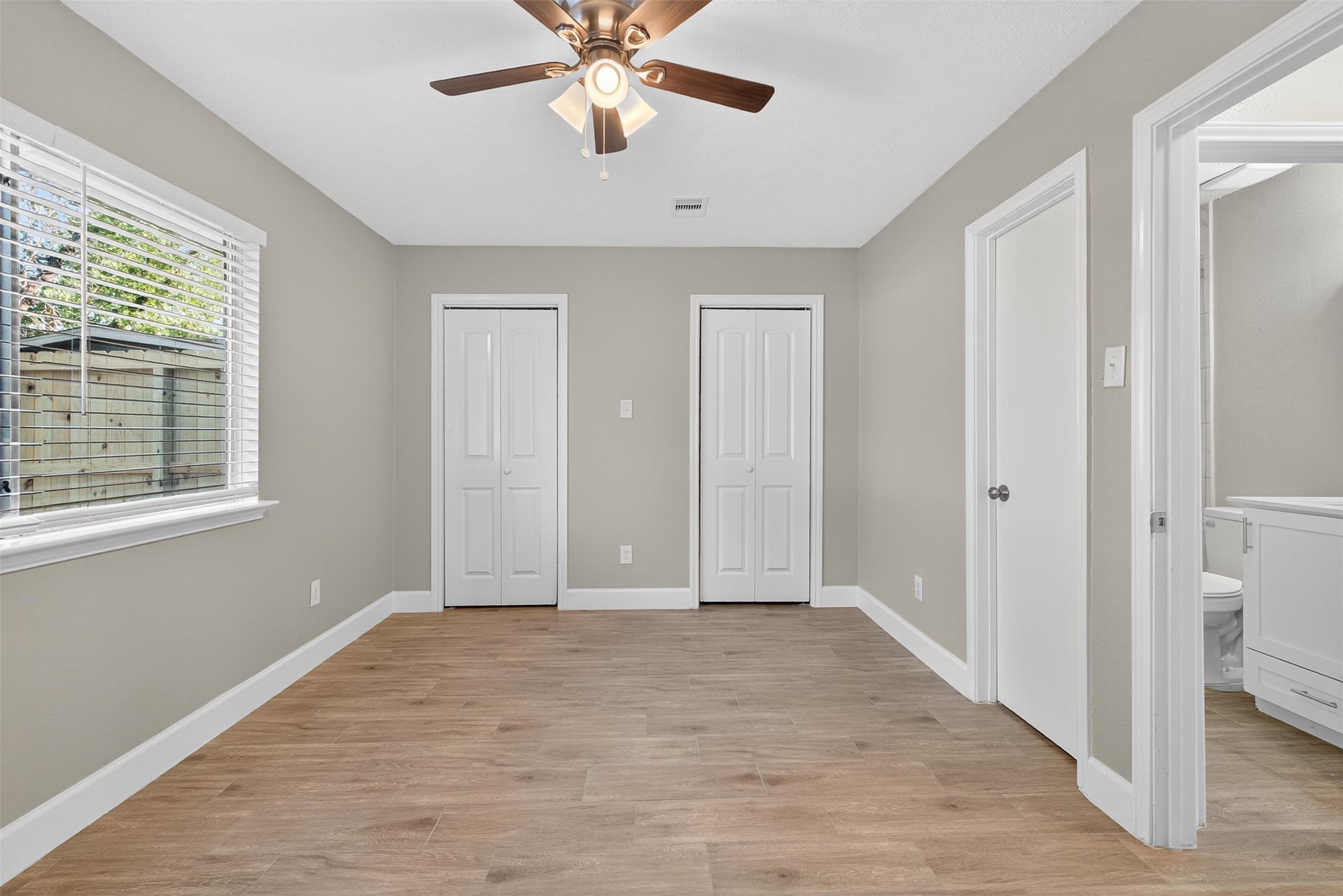 11046 Rainbow Glen Drive Houston, TX 77064 - Photo 12 of 17 a view of an empty room with a window