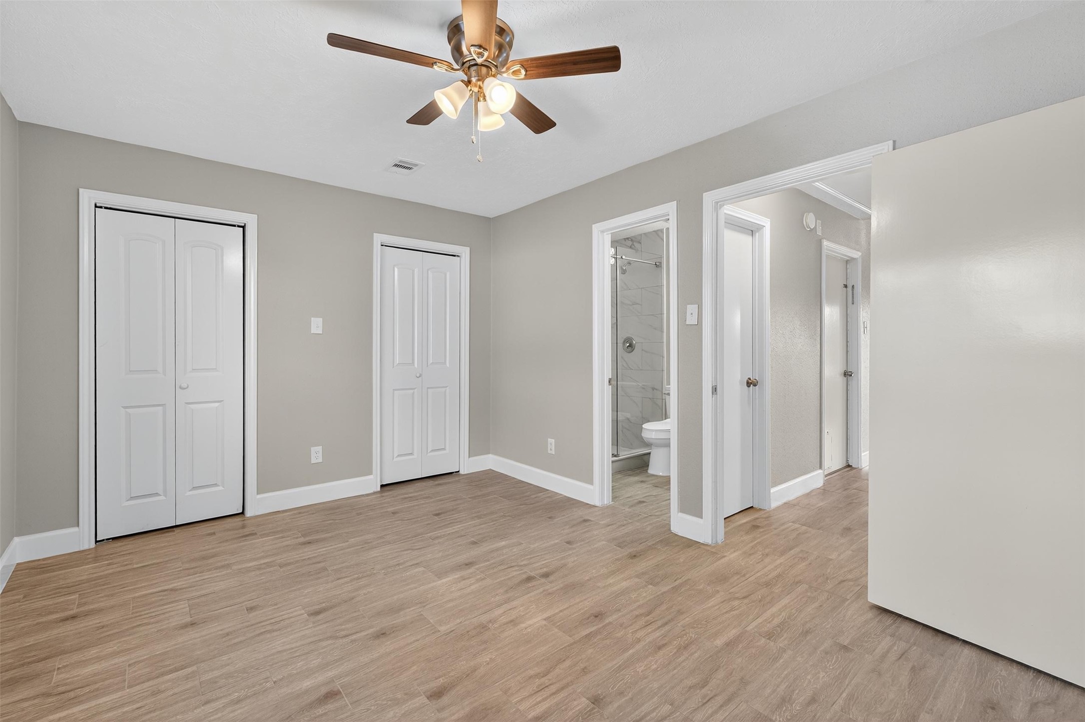 11046 Rainbow Glen Drive Houston, TX 77064 - Photo 13 of 17 a view of empty room with wooden floor