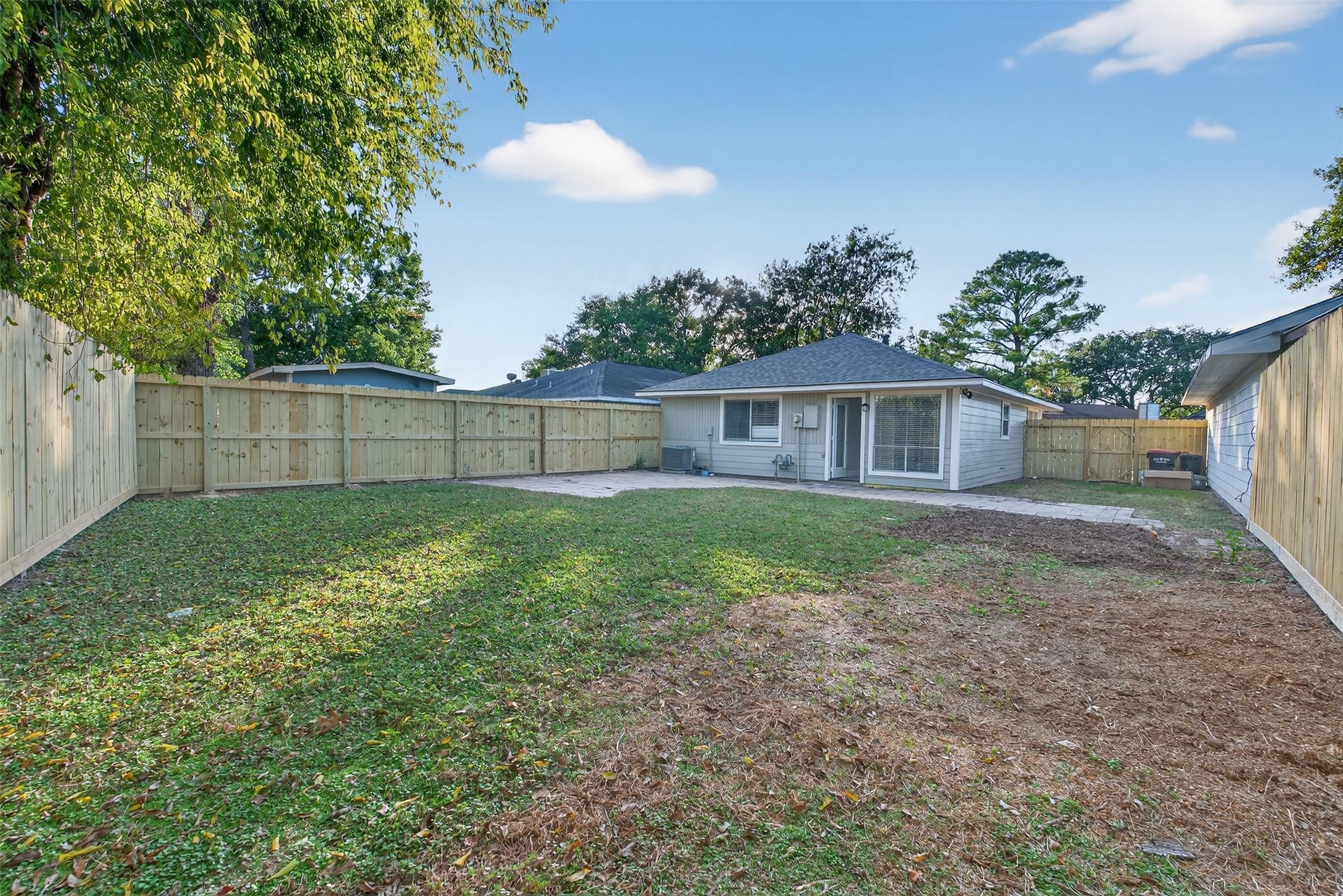 11046 Rainbow Glen Drive Houston, TX 77064 - Photo 17 of 17 a view of a house with a yard