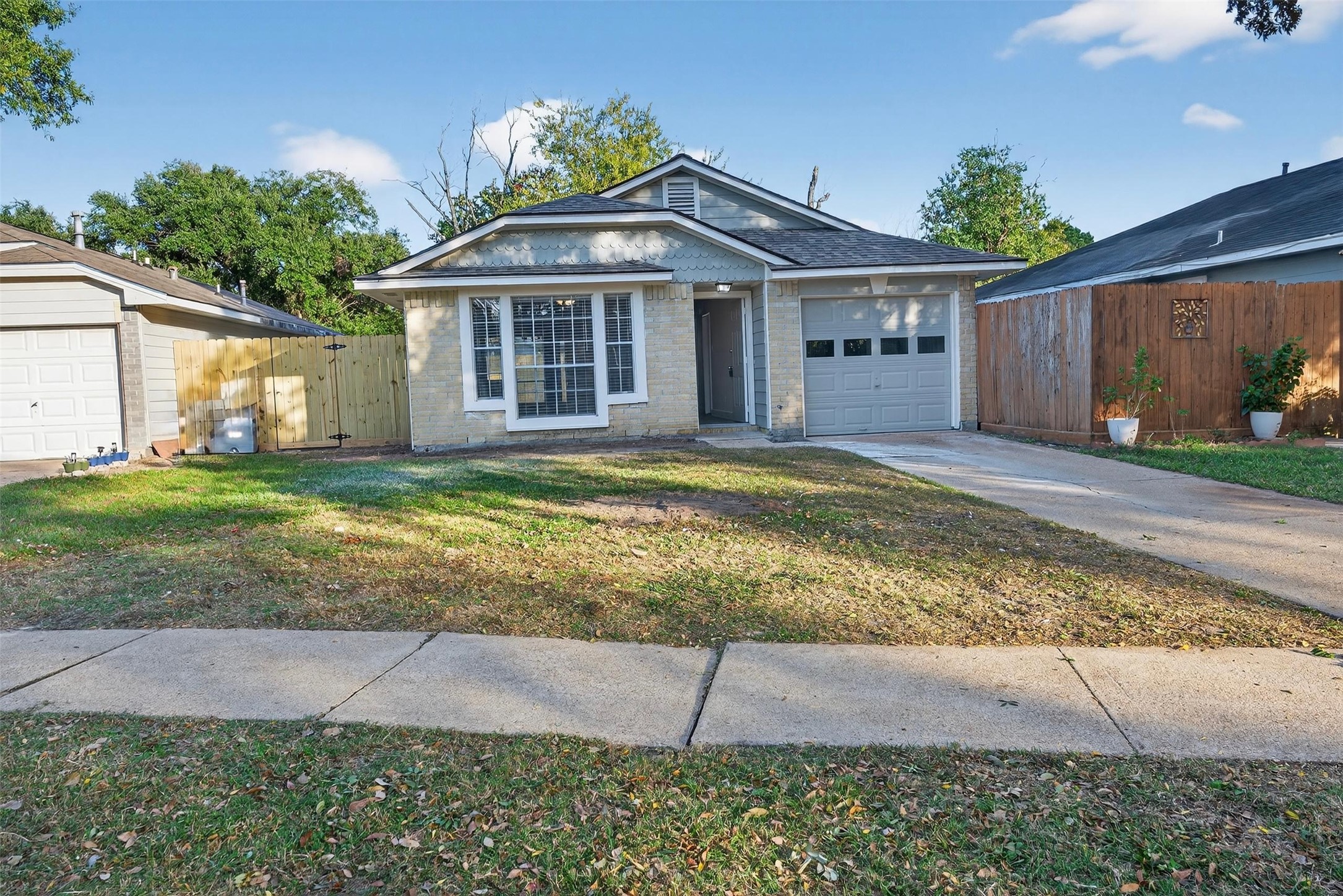 11046 Rainbow Glen Drive Houston, TX 77064 - Photo 2 of 17 a view of a house with a yard and large tree