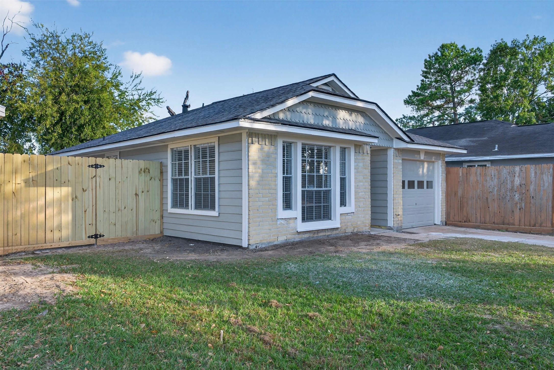 11046 Rainbow Glen Drive Houston, TX 77064 - Photo 3 of 17 a view of a house with yard and a garden