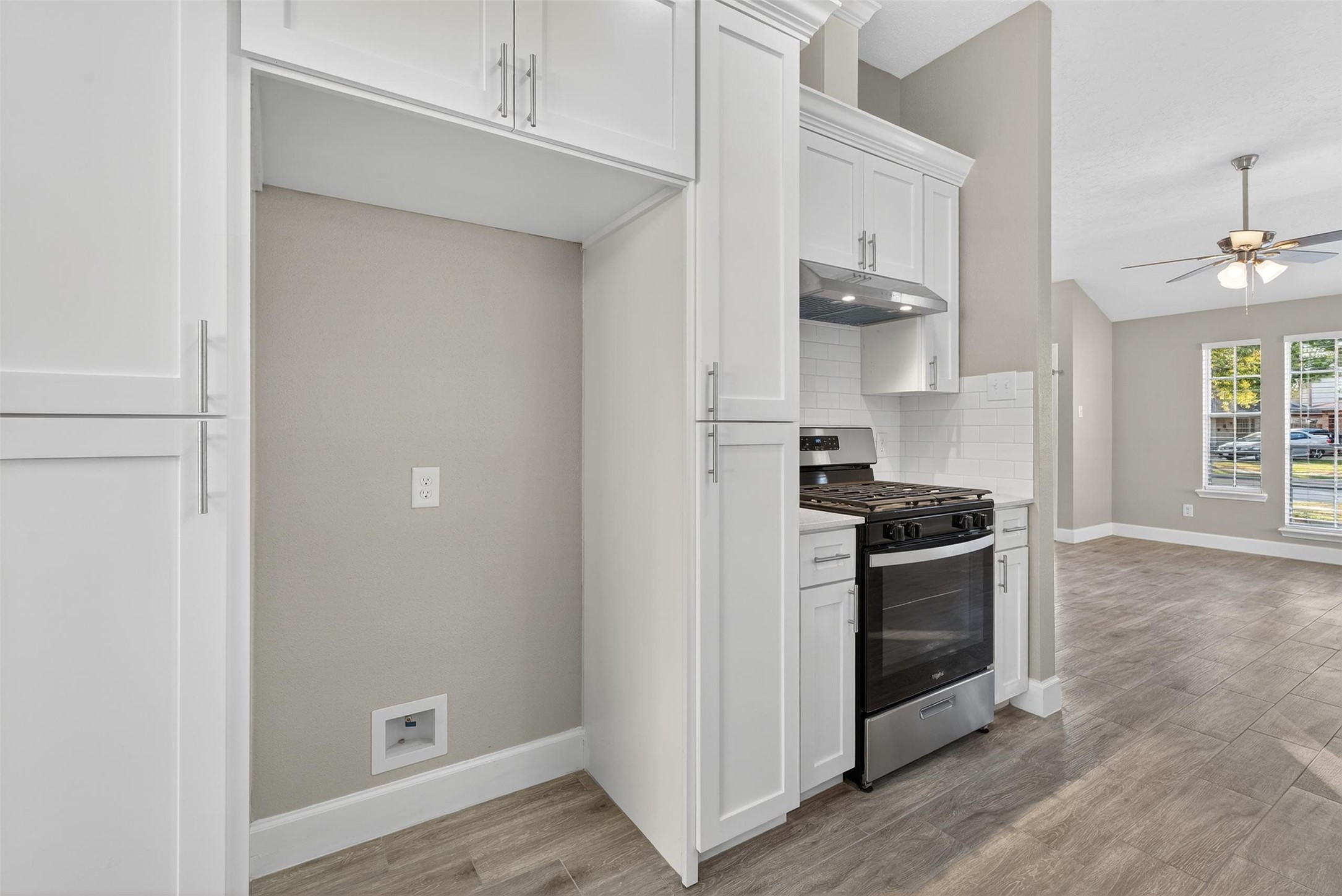 11046 Rainbow Glen Drive Houston, TX 77064 - Photo 8 of 17 a kitchen with stainless steel appliances granite countertop a stove and a refrigerator
