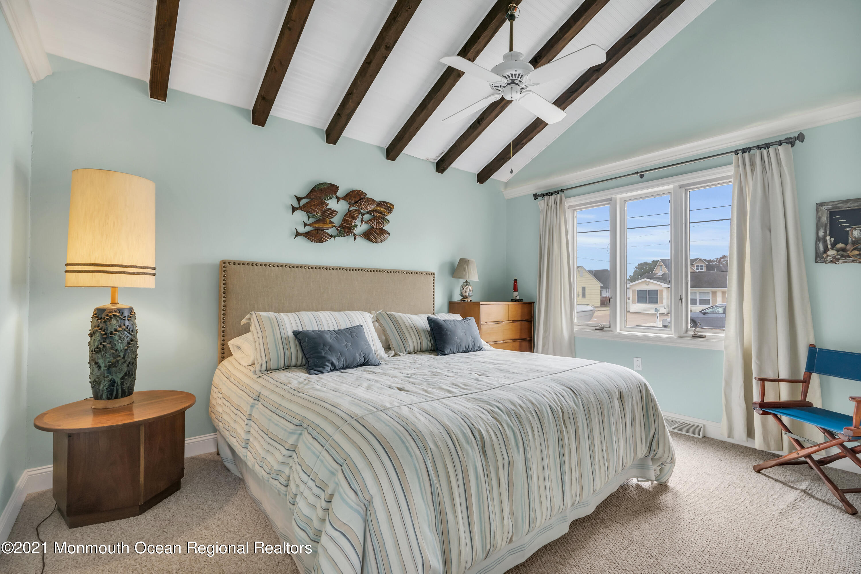 59 Cedar Run Road Bayville, NJ 08721 - Photo 16 of 32 a bedroom with a bed and a table