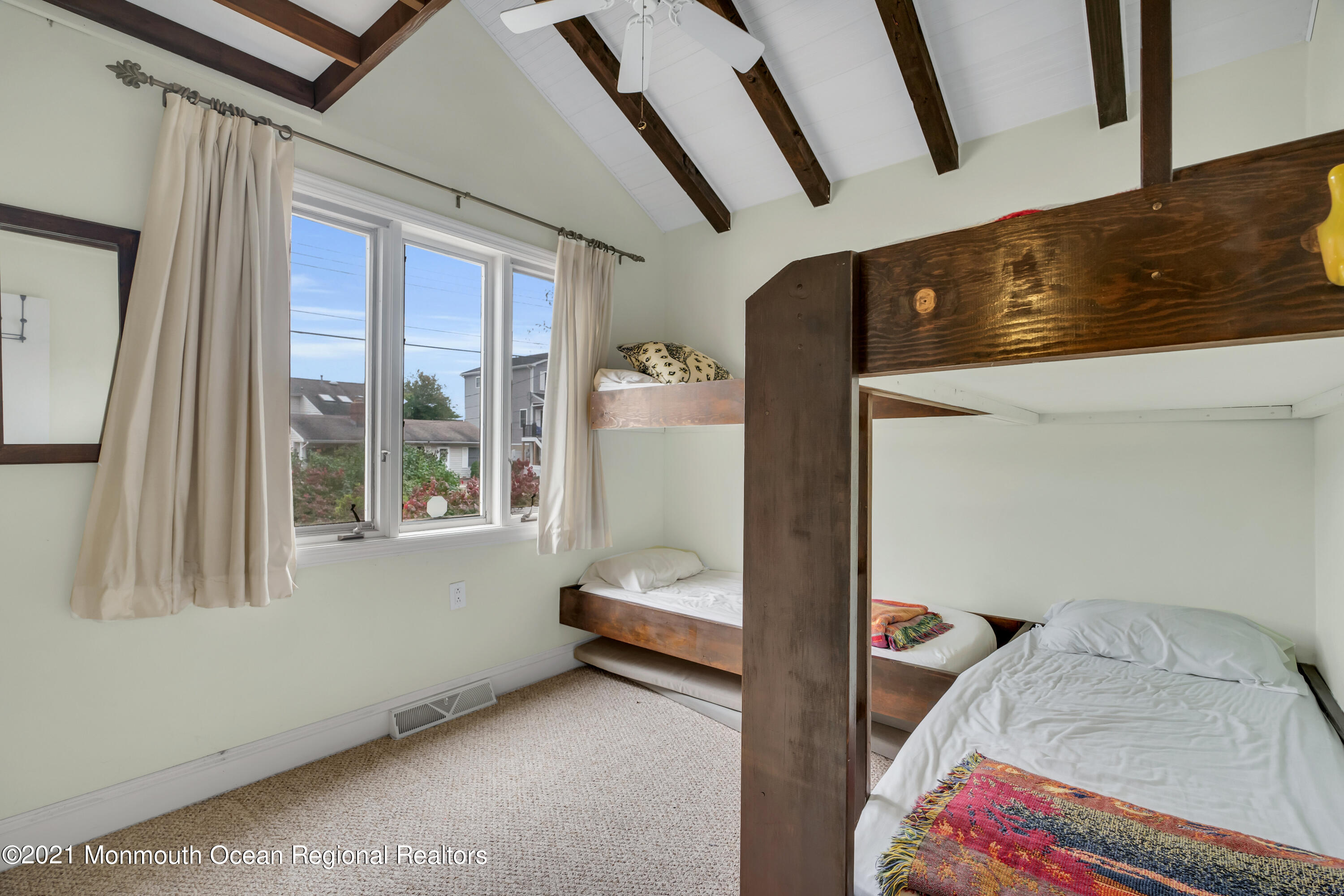 59 Cedar Run Road Bayville, NJ 08721 - Photo 17 of 32 a bedroom with a bed and wooden floor
