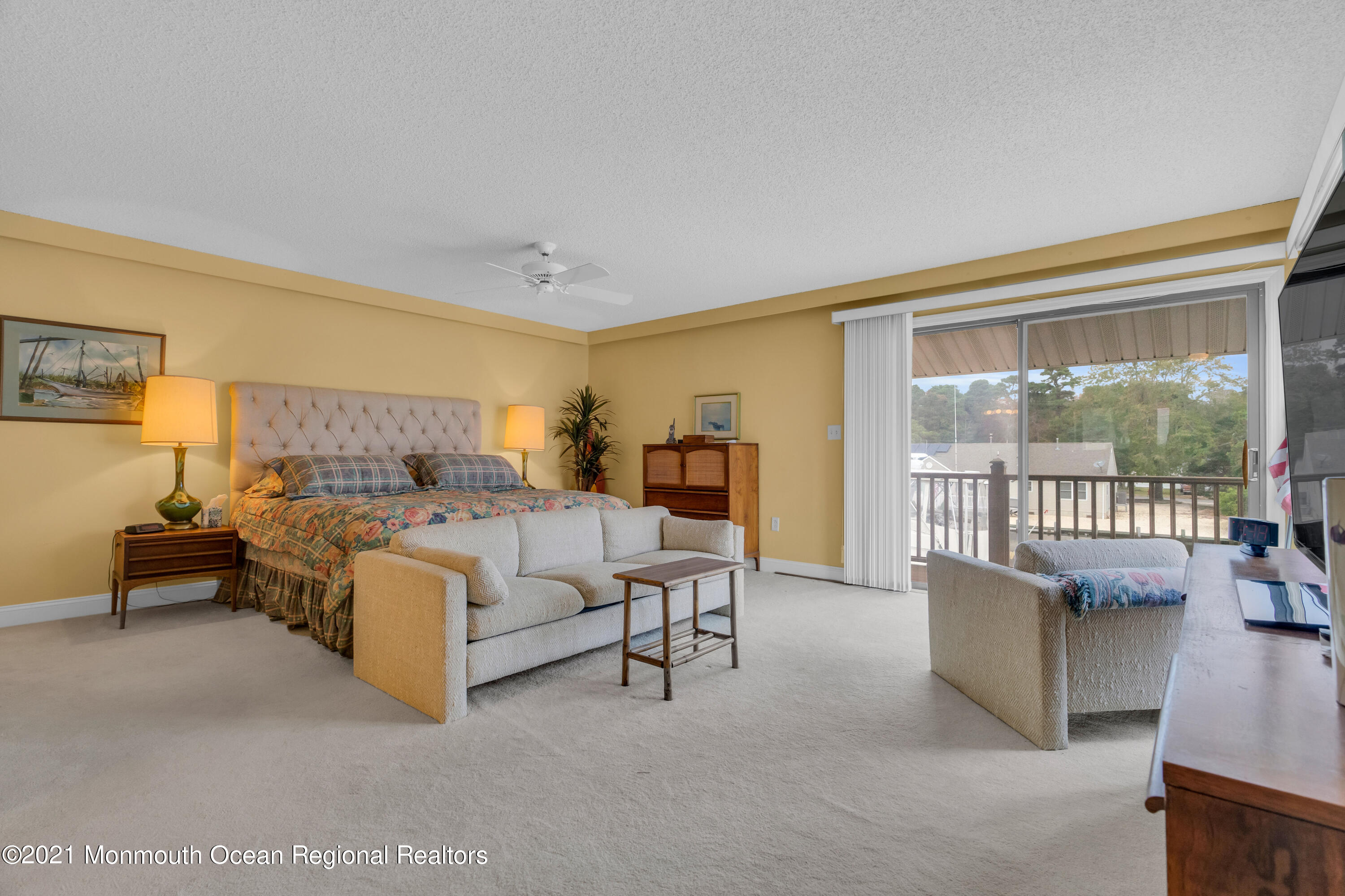 59 Cedar Run Road Bayville, NJ 08721 - Photo 23 of 32 a bedroom with furniture and large windows
