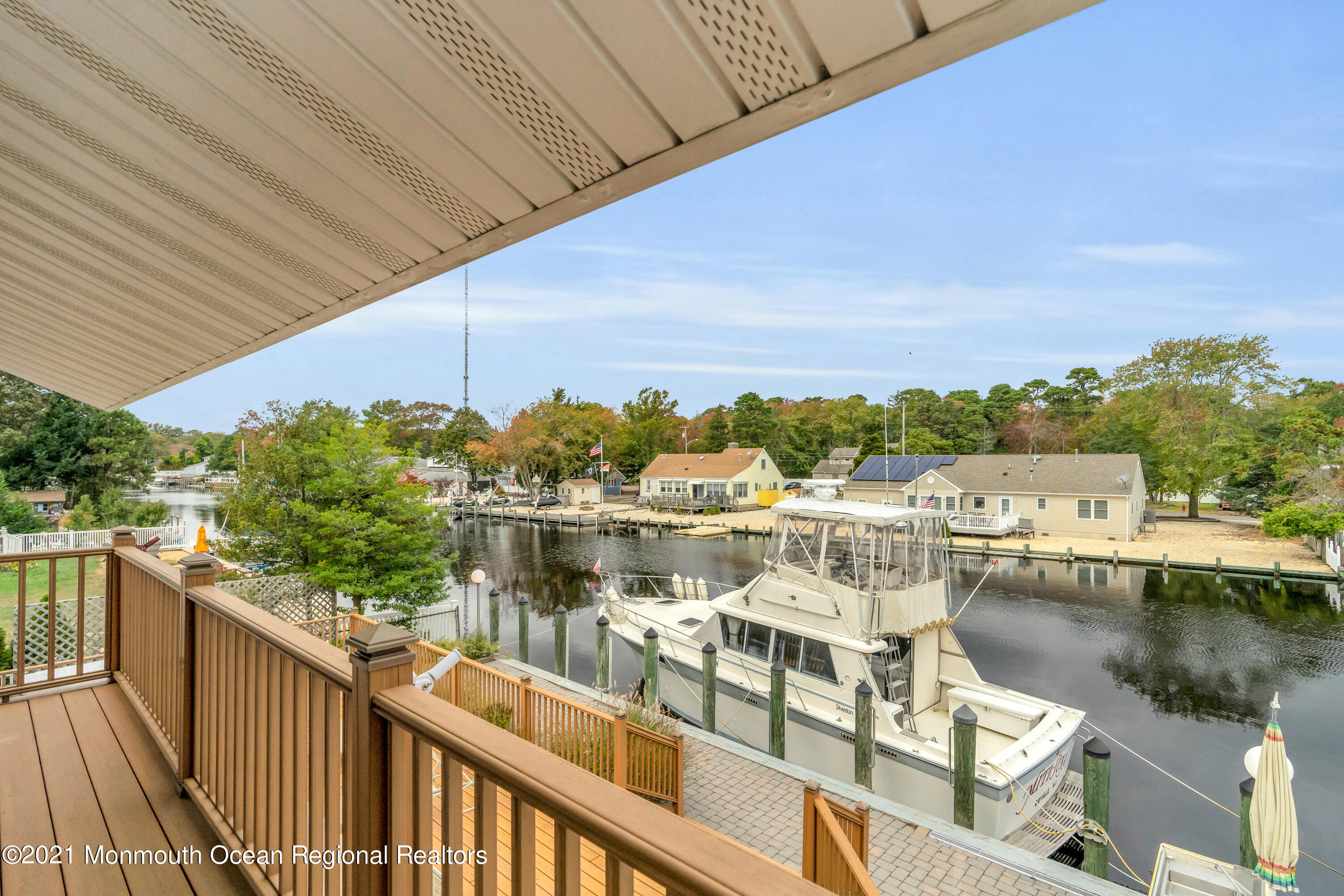 59 Cedar Run Road Bayville, NJ 08721 - Photo 26 of 32 a view of a lake from a balcony
