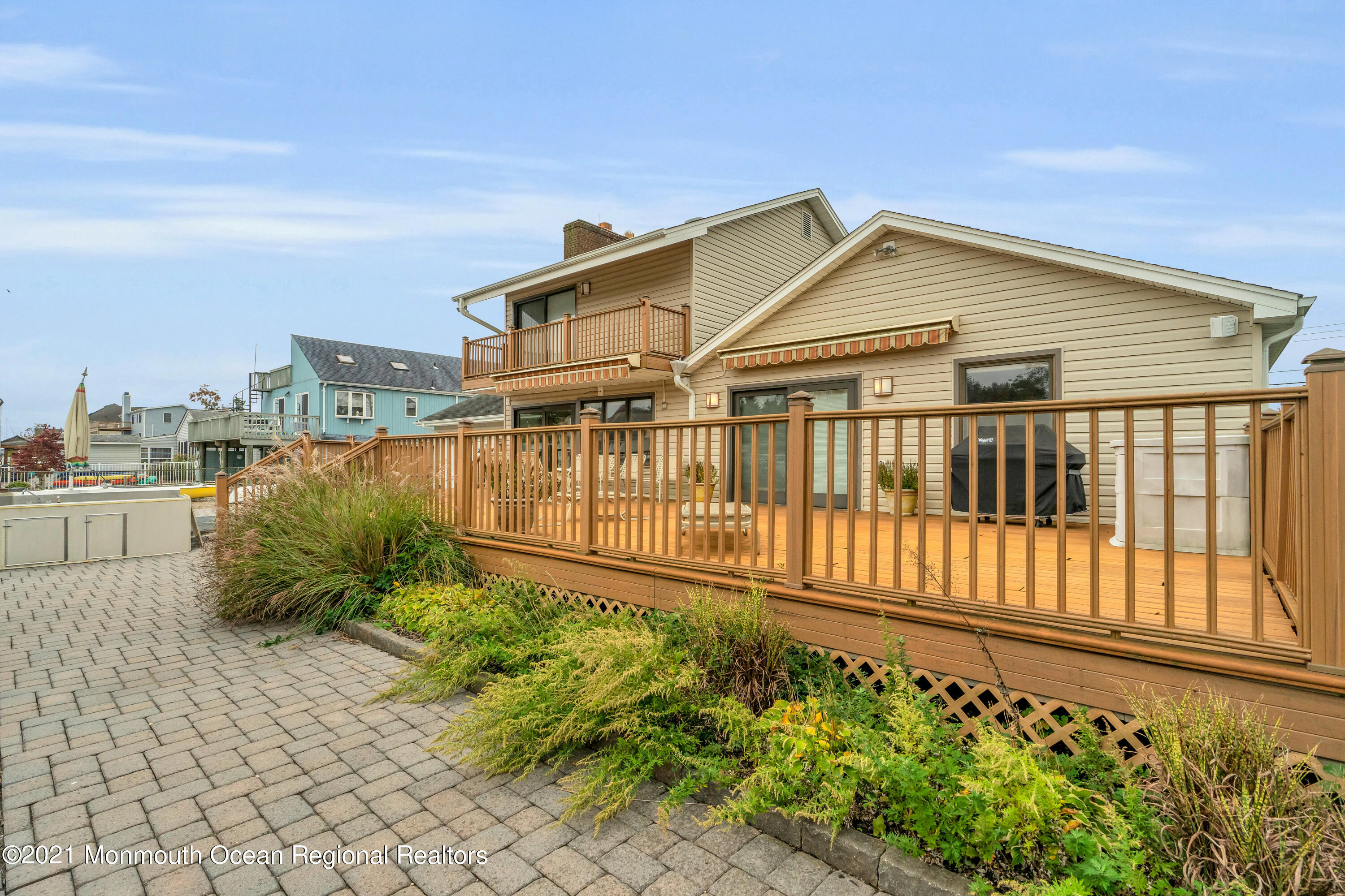 59 Cedar Run Road Bayville, NJ 08721 - Photo 30 of 32 a view of a house with a wooden fence