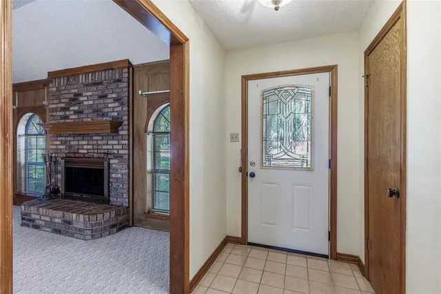 a view of a livingroom with a fireplace