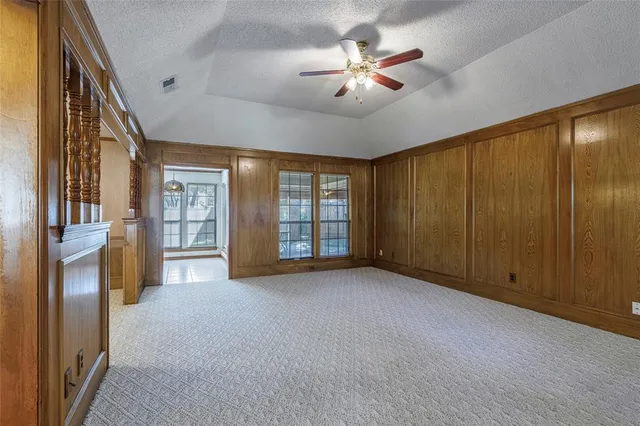 a view of an empty room with a fireplace