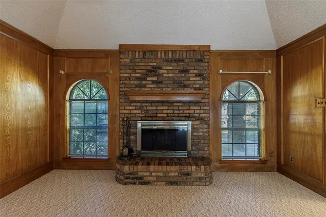 a view of livingroom with furniture and fireplace