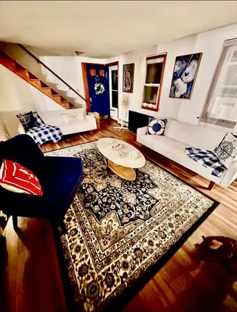 a living room with a couch and a table