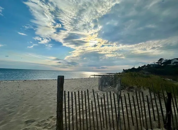 a view of a lake with a beach
