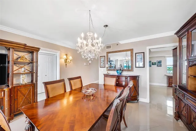 a kitchen with granite countertop cabinets stainless steel appliances and a counter space