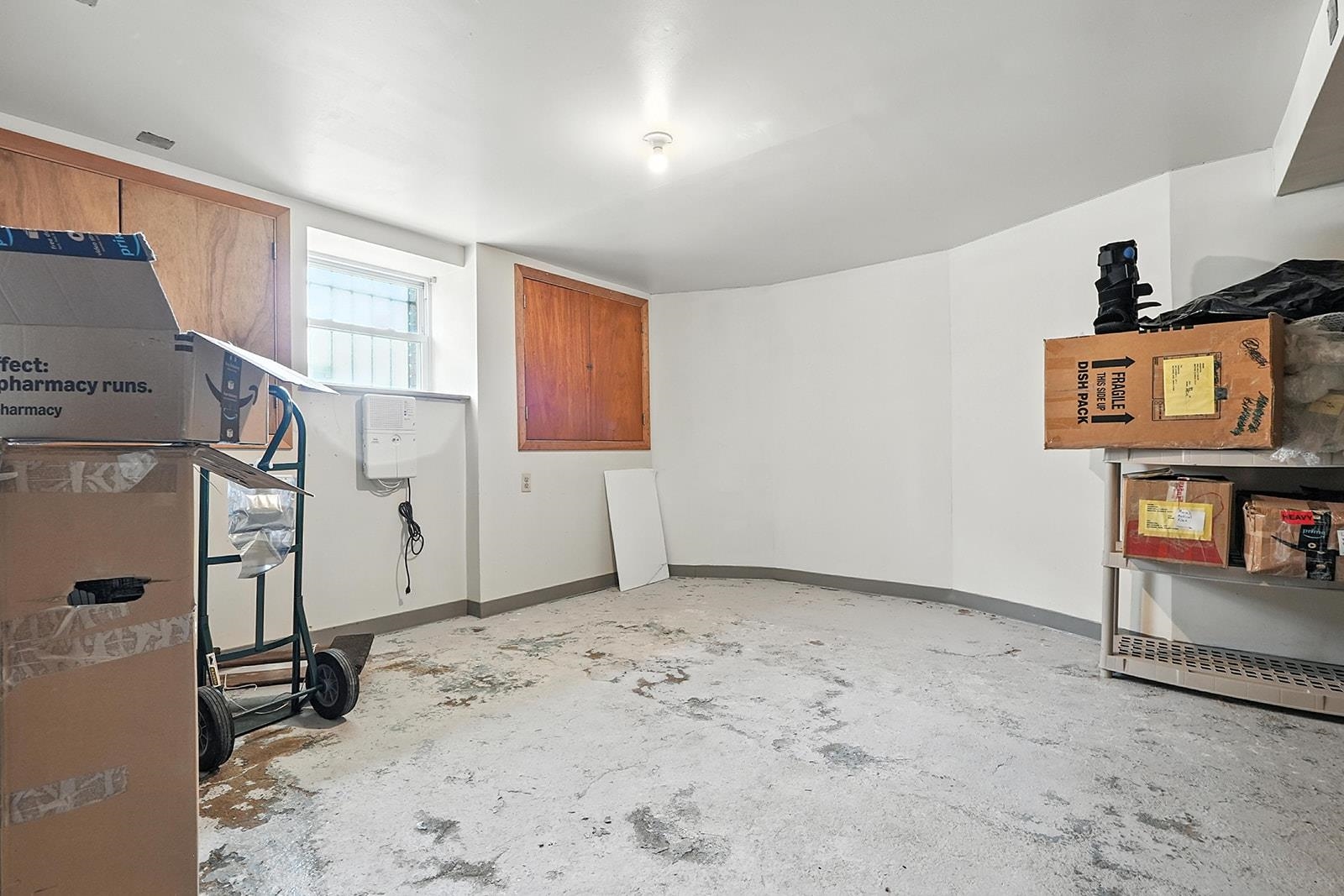 961 Avenue C Bayonne, NJ 07002 - Photo 18 of 21 a view of a storage & utility room with closet window