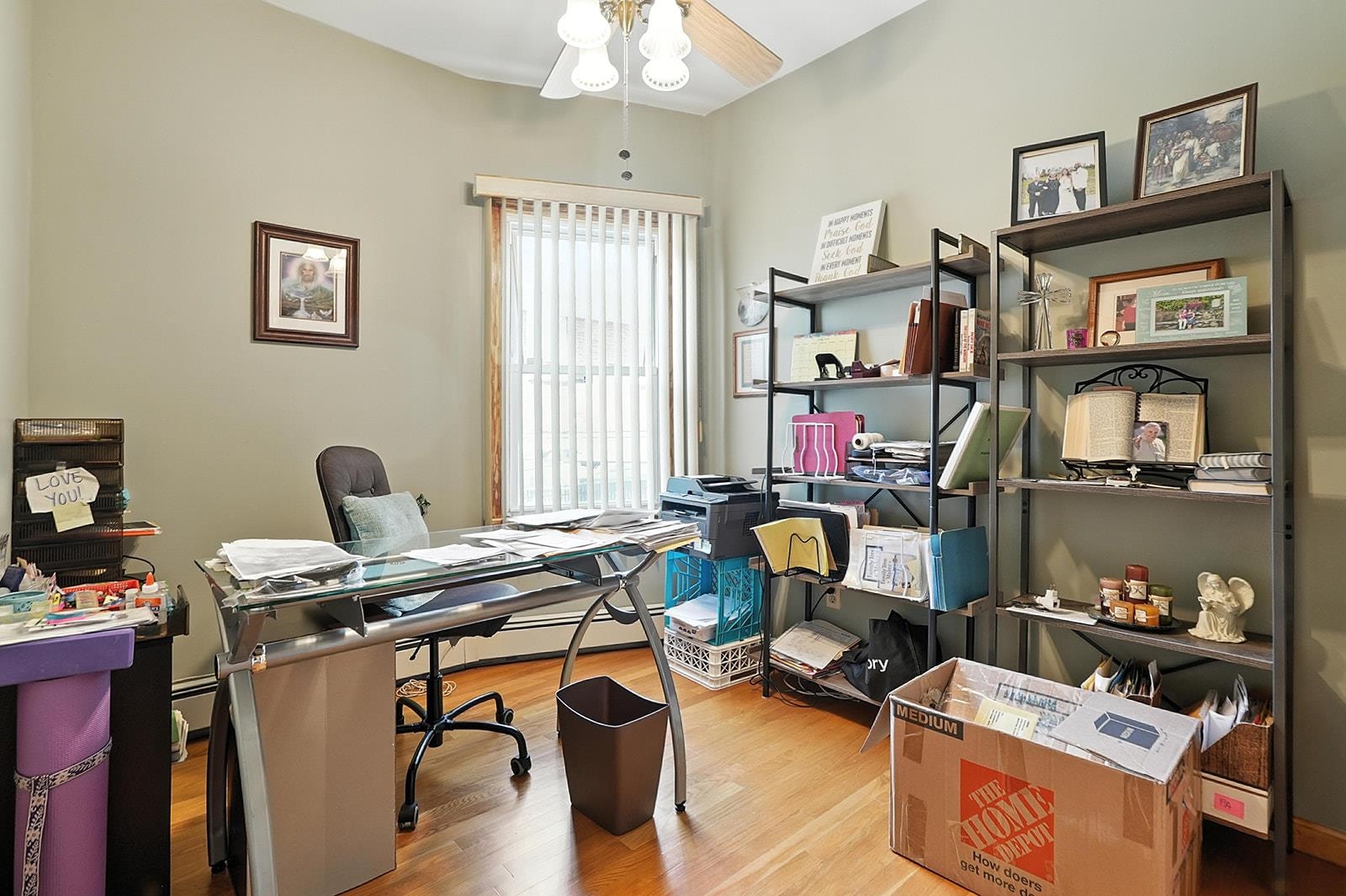 961 Avenue C Bayonne, NJ 07002 - Photo 9 of 21 a view of a workspace with furniture and a window