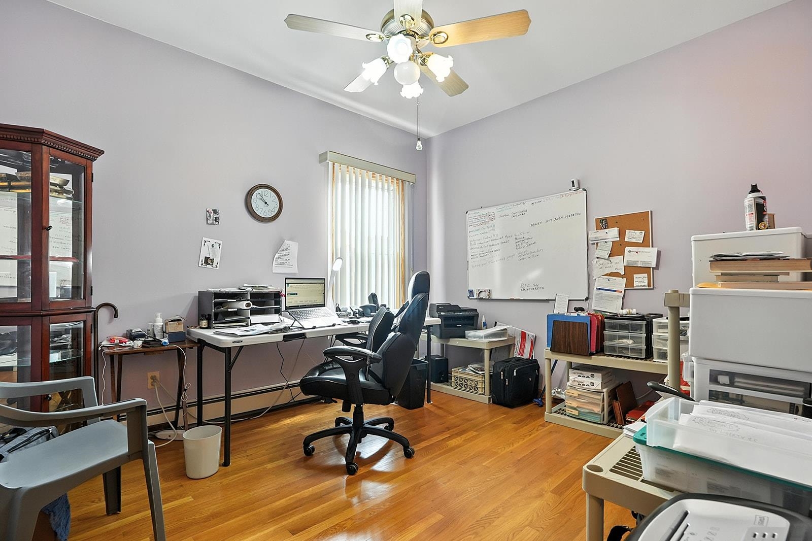 961 Avenue C Bayonne, NJ 07002 - Photo 10 of 21 a workspace with furniture window and wooden floor