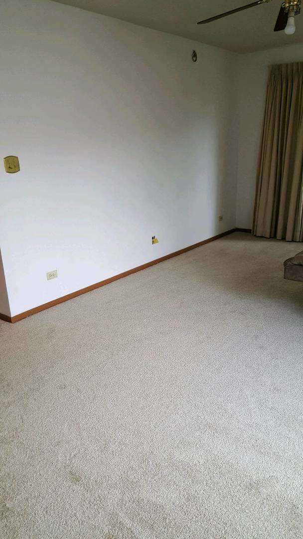 332 Park Ridge Lane, Unit E Aurora, IL 60504 - Photo 11 of 21 a view of an empty room