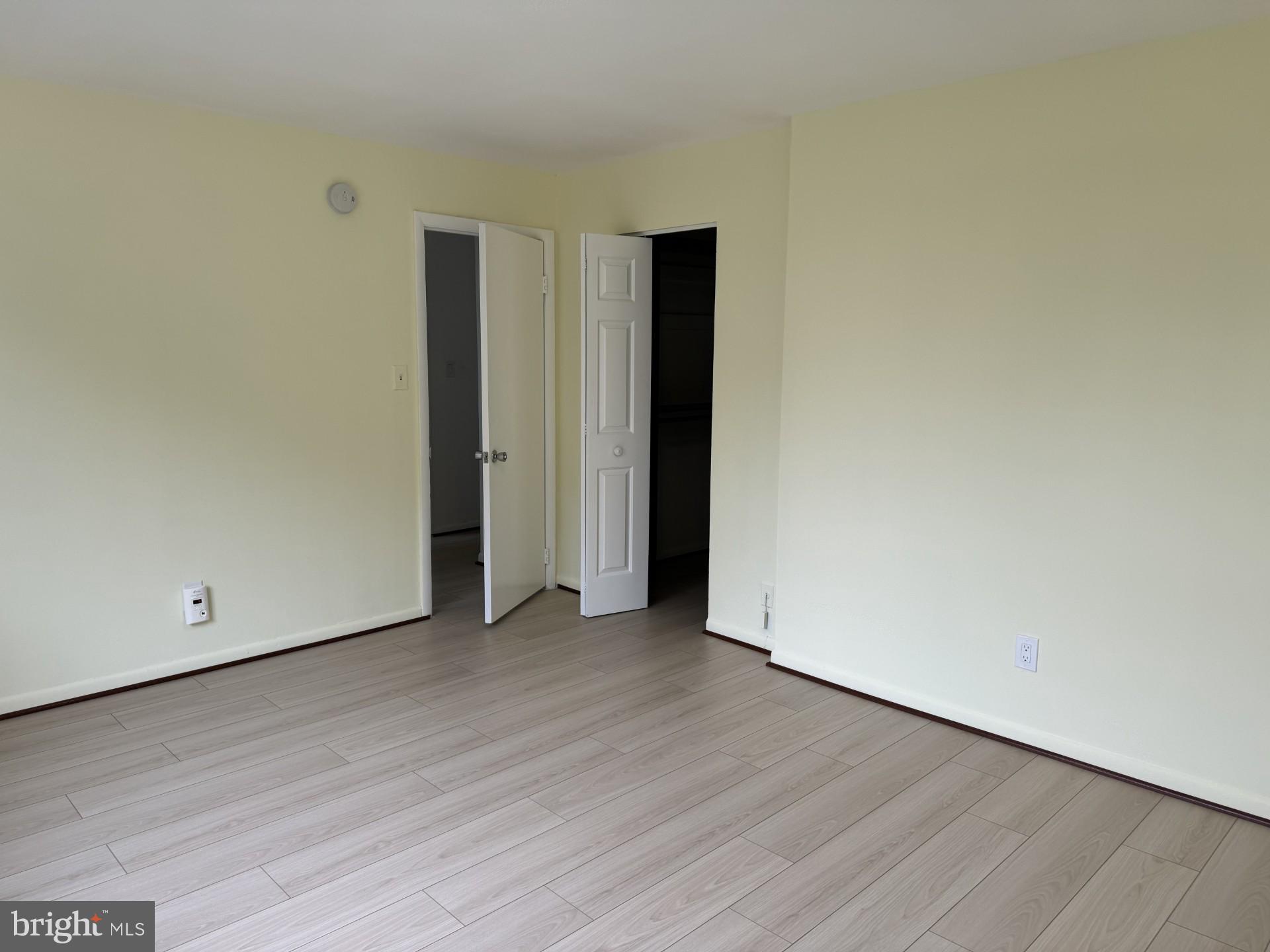 614 Sligo Avenue, Unit 508 Silver Spring, MD 20910 - Photo 18 of 31 a view of an empty room with wooden floor