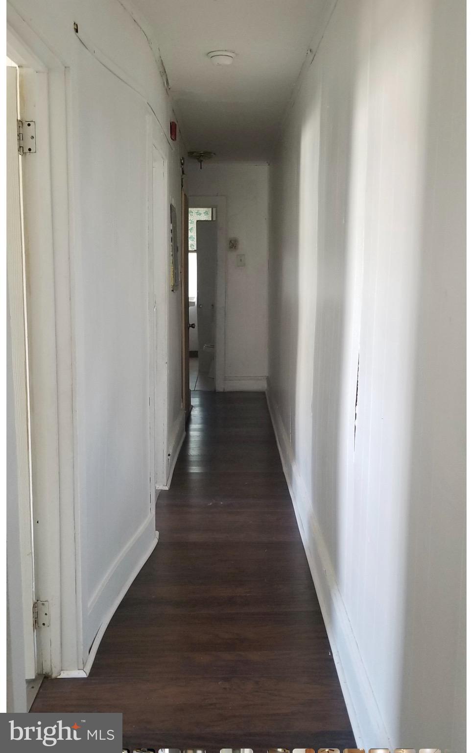 557 North Creighton Street Philadelphia, PA 19131 - Photo 4 of 9 a view of a hallway with wooden floor