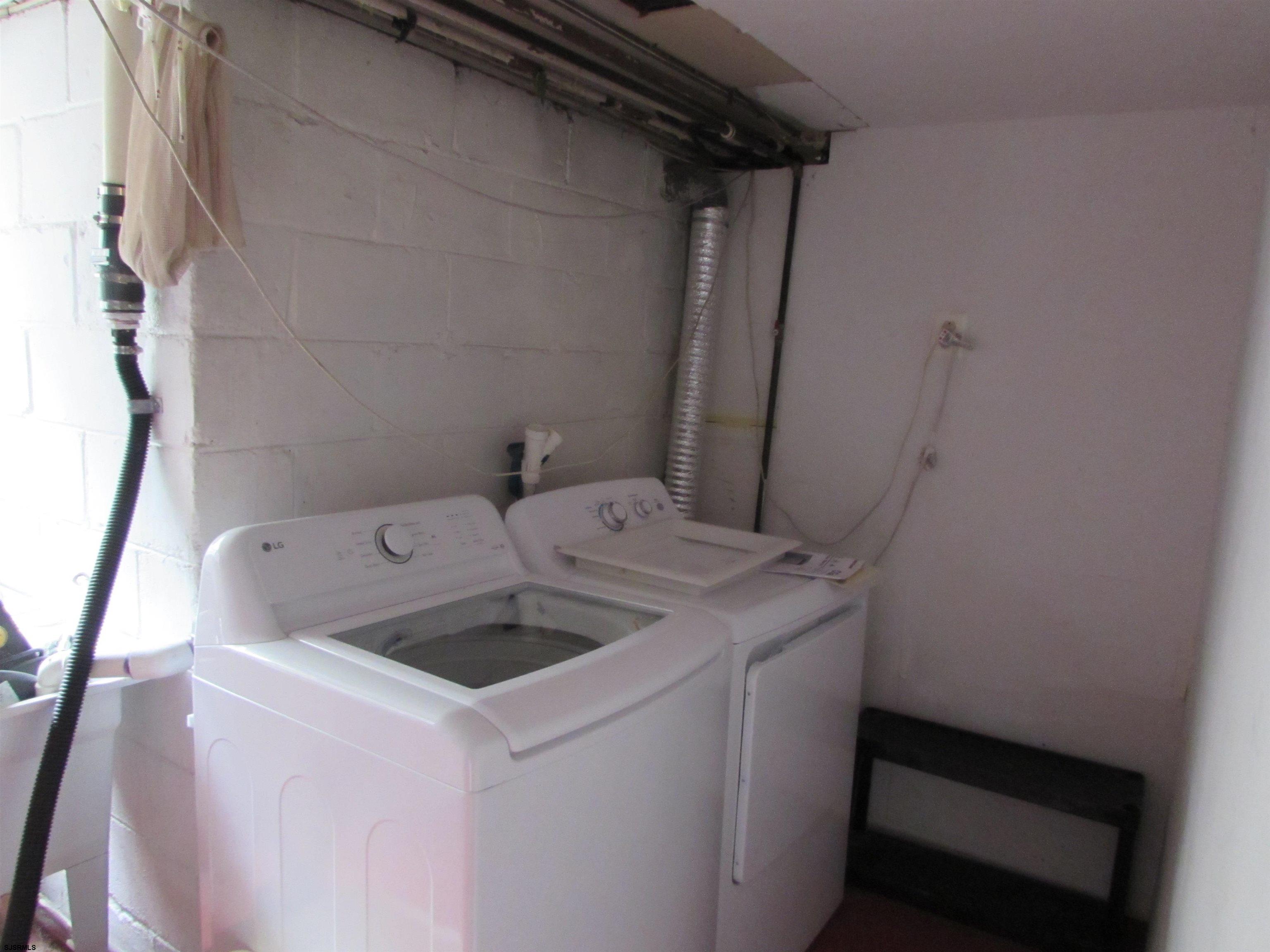 744 Shore Road Linwood, NJ 08221 - Photo 19 of 43 a utility room with dryer and washer