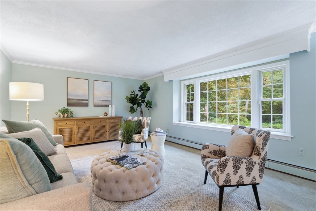 369 Border Road Concord, MA 01742 - Photo 4 of 34 a living room with furniture and a large window