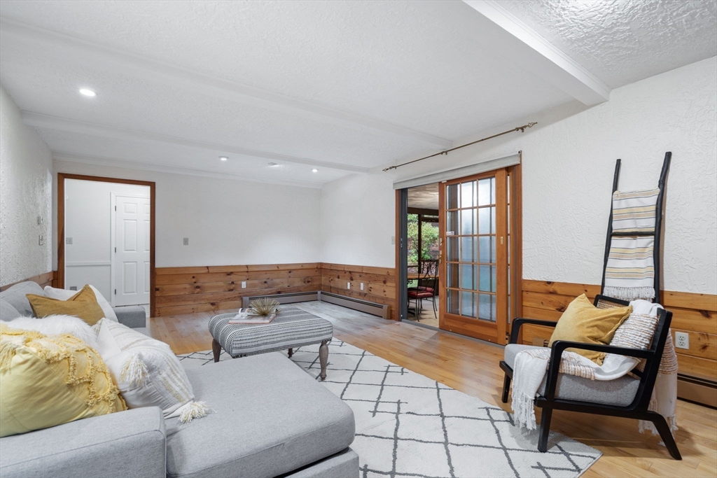 369 Border Road Concord, MA 01742 - Photo 10 of 34 a living room with furniture and large window