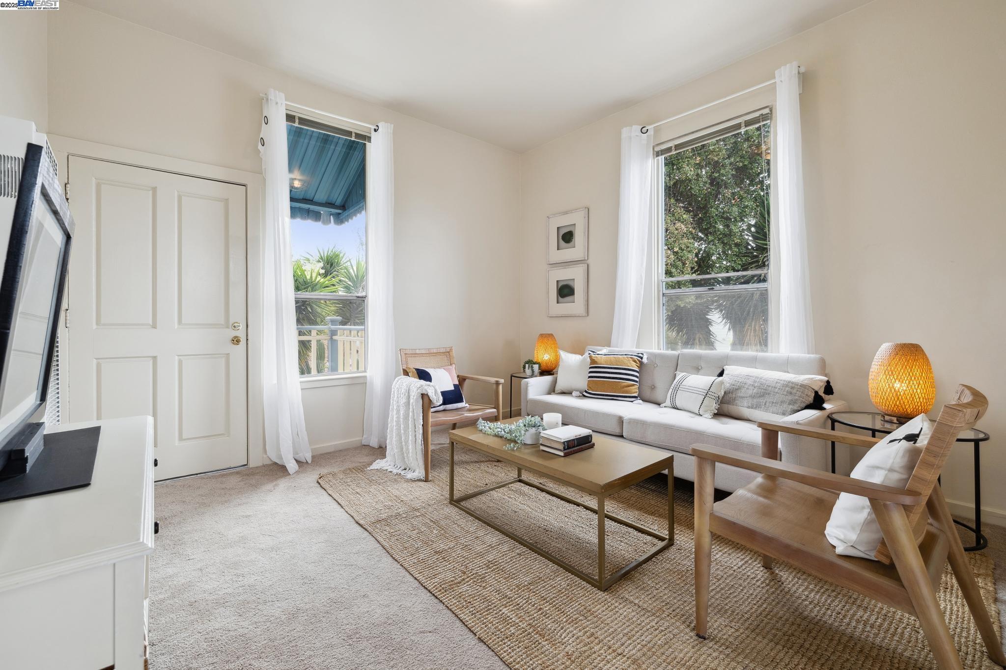 1820 3rd Street Alameda, CA 94501 - Photo 7 of 60 a living room with furniture and a window
