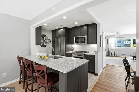 a living room with furniture and window