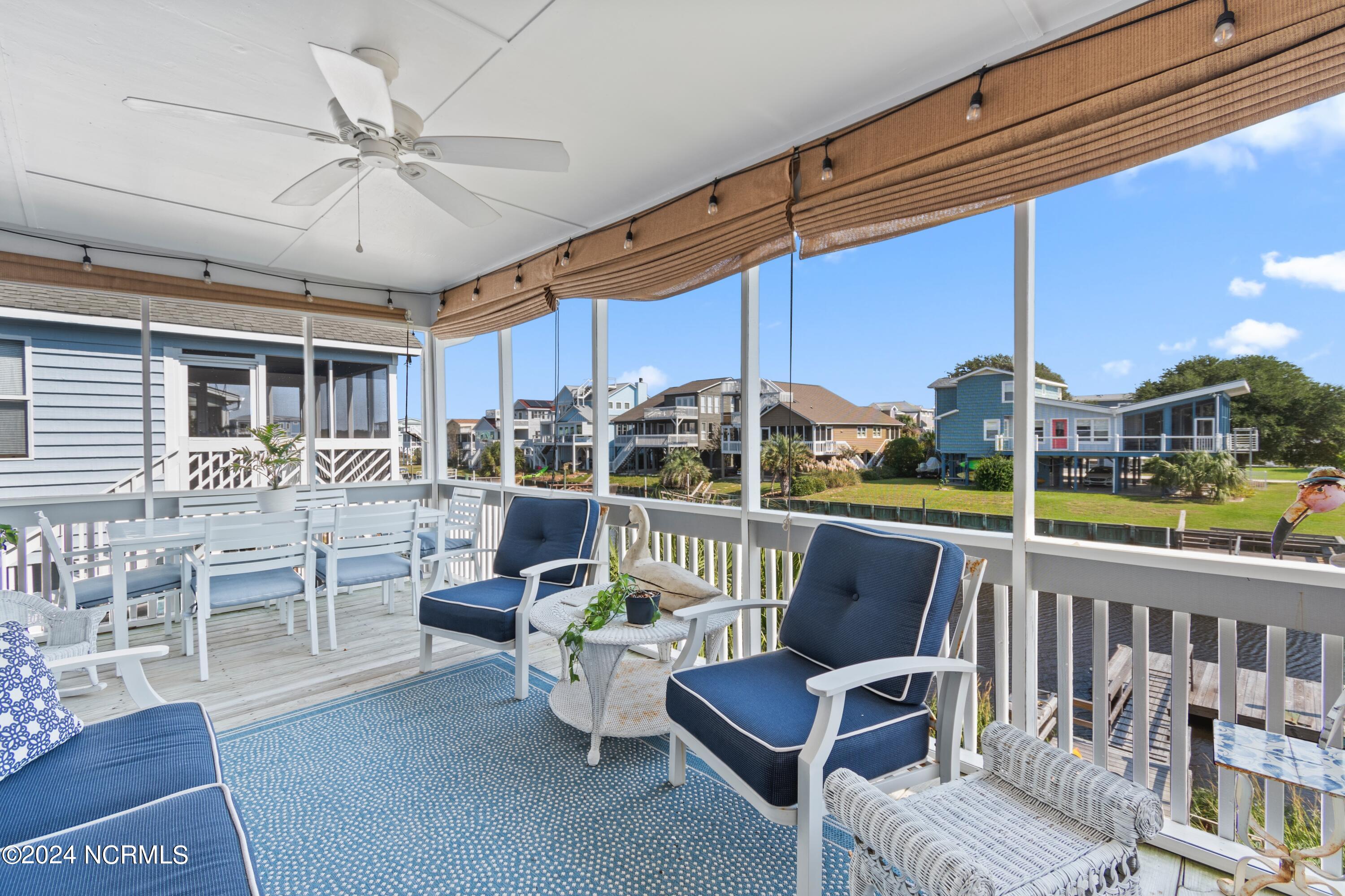 415 Sailfish Street Sunset Beach, NC 28468 - Photo 42 of 63 Large, screened porch. Picture yourself reading, enjoying family game nights or entertaining a crowd.
