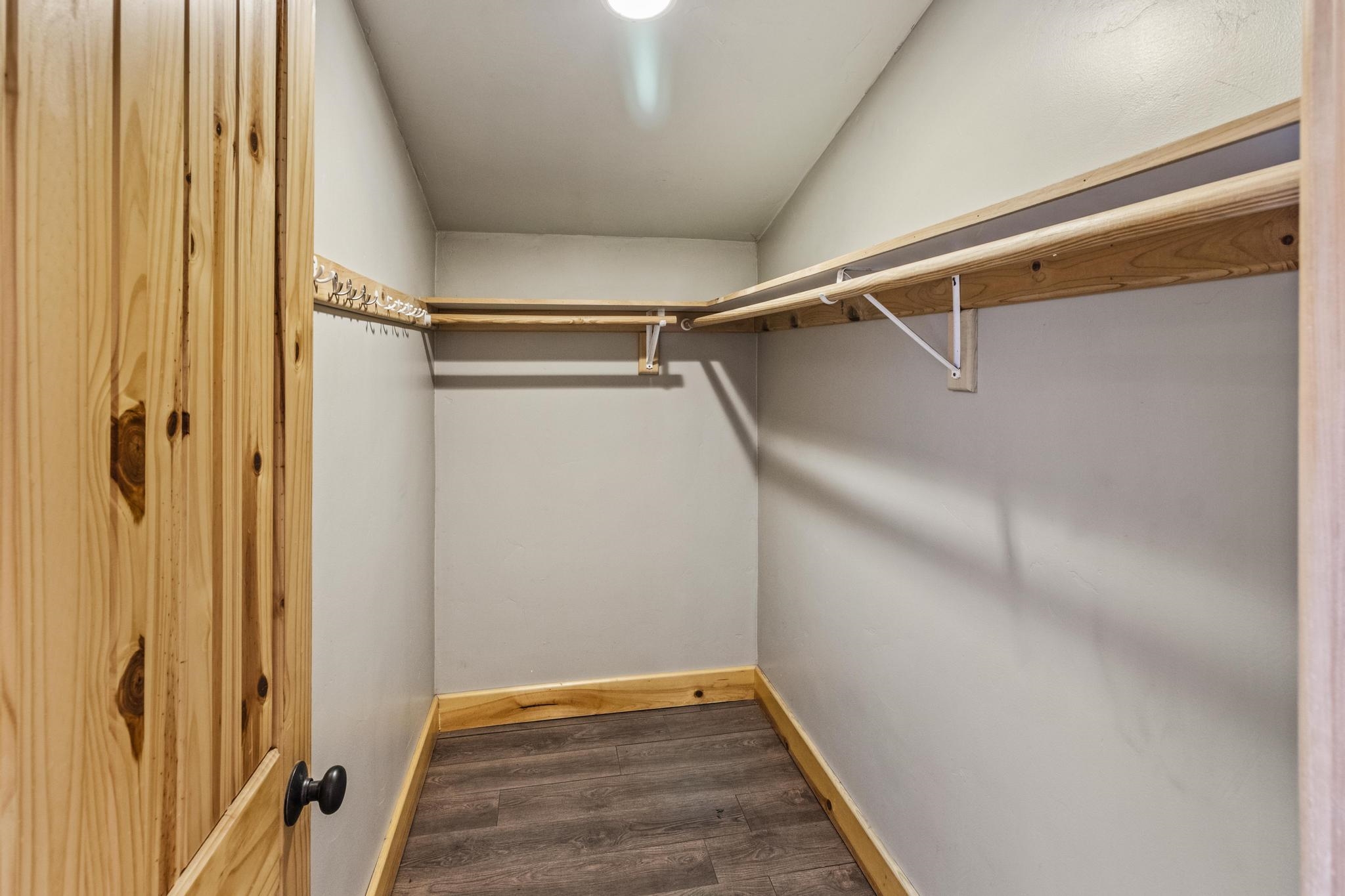 6980 Toyon Road Tahoe Vista, CA 96148 - Photo 15 of 20 a view of walk in closet with wooden floor