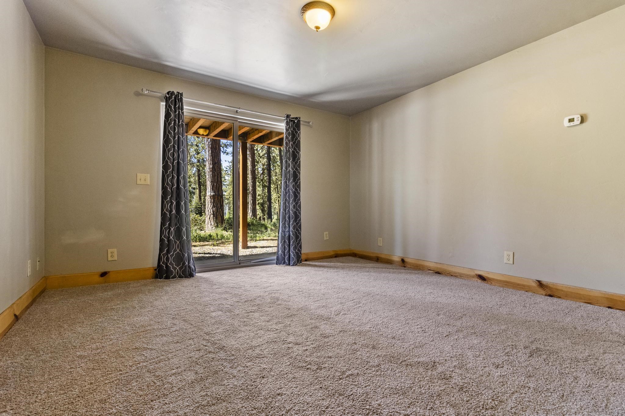 6980 Toyon Road Tahoe Vista, CA 96148 - Photo 18 of 20 a view of an empty room and window