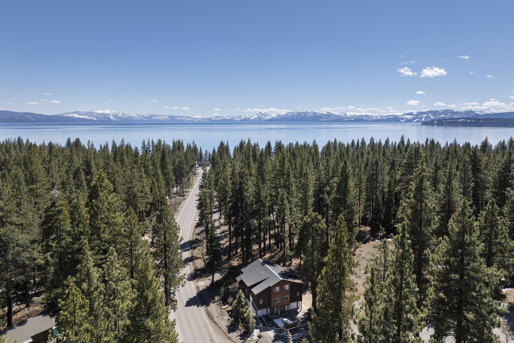 6980 Toyon Road Tahoe Vista, CA 96148 - Photo 3 of 20 a view of an lake and a mountain