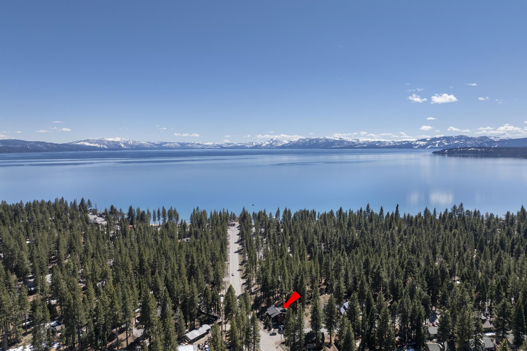 6980 Toyon Road Tahoe Vista, CA 96148 - Photo 4 of 20 a view of a lake from a yard