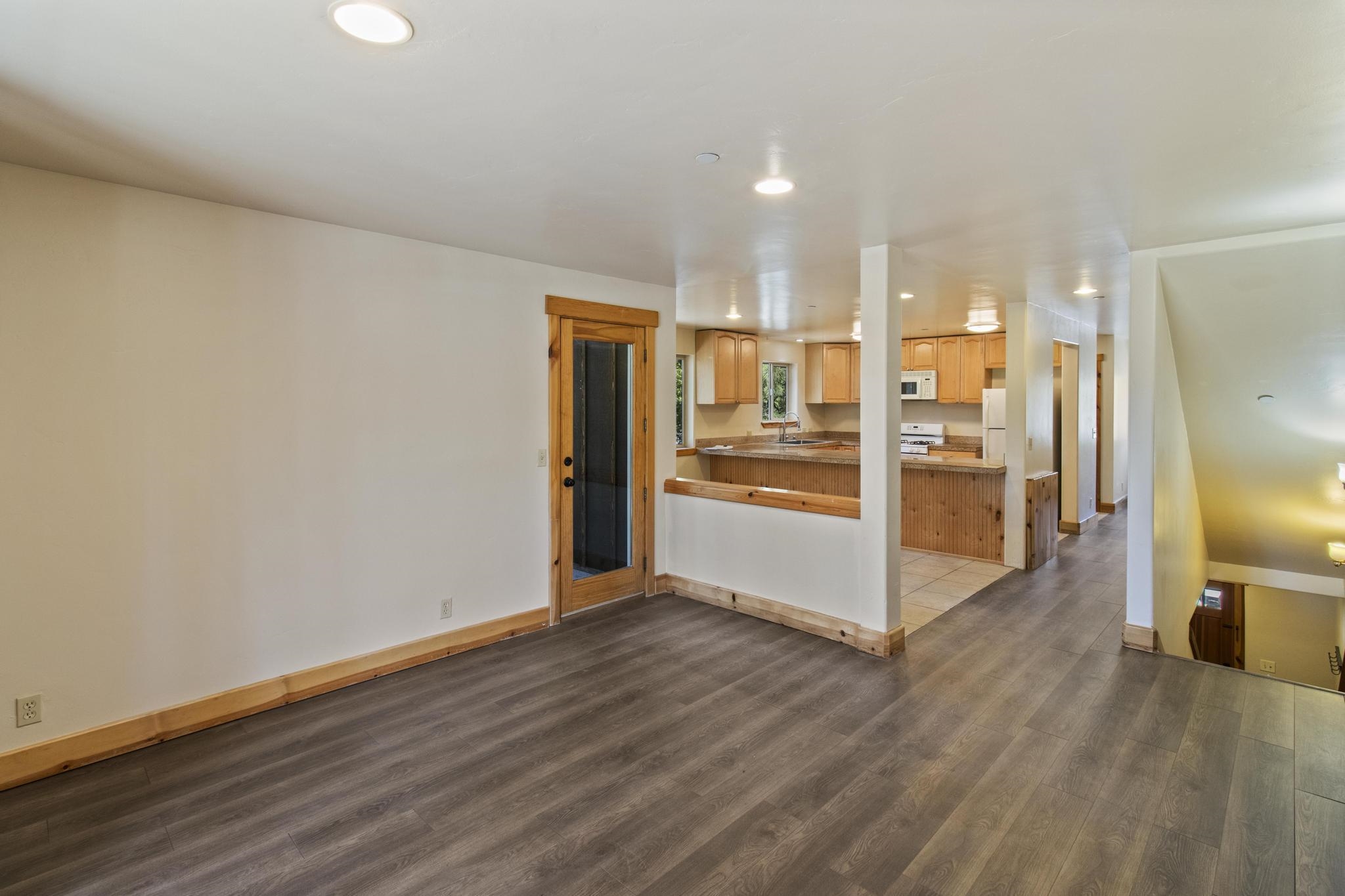 6980 Toyon Road Tahoe Vista, CA 96148 - Photo 7 of 20 a view of a kitchen with a refrigerator and a stove