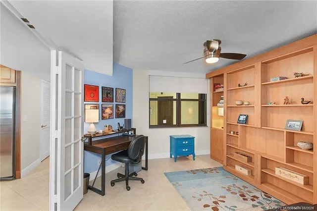 a view of a workspace with furniture