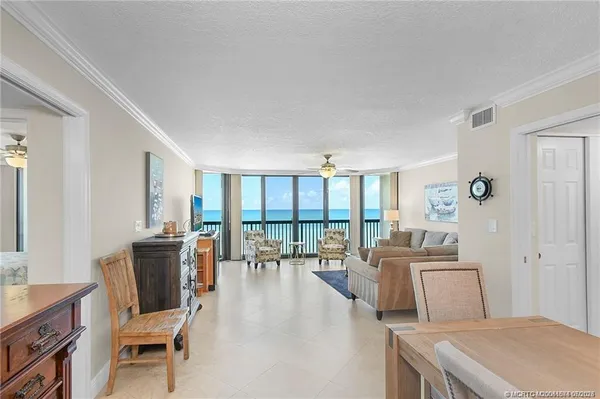 a room with lots of table and chairs