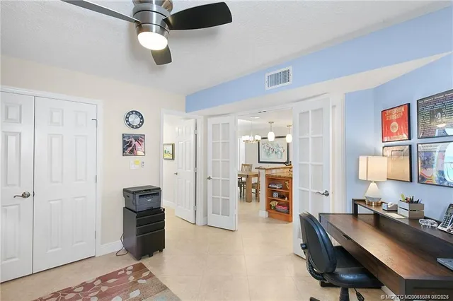 a workspace with furniture and window