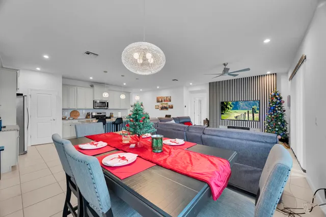 a view of a dining room with furniture