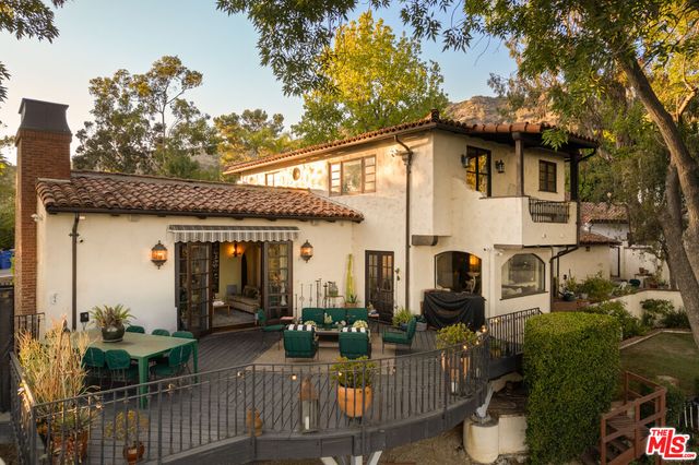 a view of a house with patio